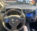 Белый Ниссан Тиида, объемом двигателя 1.6 л и пробегом 190 тыс. км за 4999 $, фото 14 на Automoto.ua