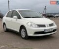 Белый Ниссан Тиида, объемом двигателя 1.6 л и пробегом 210 тыс. км за 5900 $, фото 1 на Automoto.ua