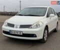 Белый Ниссан Тиида, объемом двигателя 1.6 л и пробегом 210 тыс. км за 5900 $, фото 1 на Automoto.ua