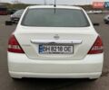 Белый Ниссан Тиида, объемом двигателя 1.6 л и пробегом 210 тыс. км за 5900 $, фото 4 на Automoto.ua