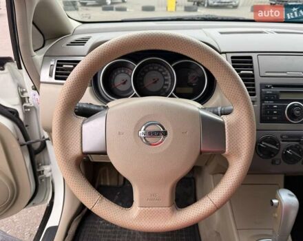 Белый Ниссан Тиида, объемом двигателя 1.6 л и пробегом 210 тыс. км за 5900 $, фото 9 на Automoto.ua