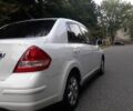 Белый Ниссан Тиида, объемом двигателя 1.8 л и пробегом 145 тыс. км за 6000 $, фото 1 на Automoto.ua