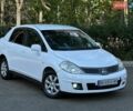 Белый Ниссан Тиида, объемом двигателя 1.8 л и пробегом 220 тыс. км за 4199 $, фото 1 на Automoto.ua