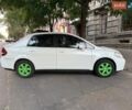 Белый Ниссан Тиида, объемом двигателя 1.6 л и пробегом 170 тыс. км за 5300 $, фото 1 на Automoto.ua