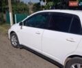Белый Ниссан Тиида, объемом двигателя 1.8 л и пробегом 210 тыс. км за 5700 $, фото 1 на Automoto.ua