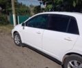 Белый Ниссан Тиида, объемом двигателя 1.8 л и пробегом 210 тыс. км за 5200 $, фото 1 на Automoto.ua