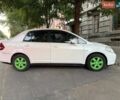Белый Ниссан Тиида, объемом двигателя 1.6 л и пробегом 160 тыс. км за 5500 $, фото 1 на Automoto.ua