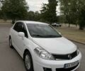 Белый Ниссан Тиида, объемом двигателя 1.6 л и пробегом 223 тыс. км за 5400 $, фото 1 на Automoto.ua