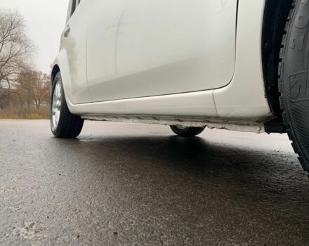 Белый Ниссан Тиида, объемом двигателя 1.8 л и пробегом 195 тыс. км за 6000 $, фото 7 на Automoto.ua