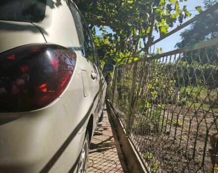 Бежевый Ниссан Тиида, объемом двигателя 1.6 л и пробегом 190 тыс. км за 4800 $, фото 2 на Automoto.ua