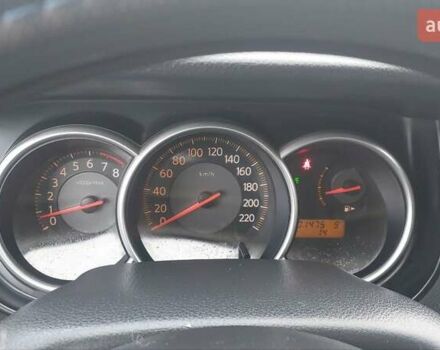 Бежевый Ниссан Тиида, объемом двигателя 1.6 л и пробегом 100 тыс. км за 6100 $, фото 20 на Automoto.ua