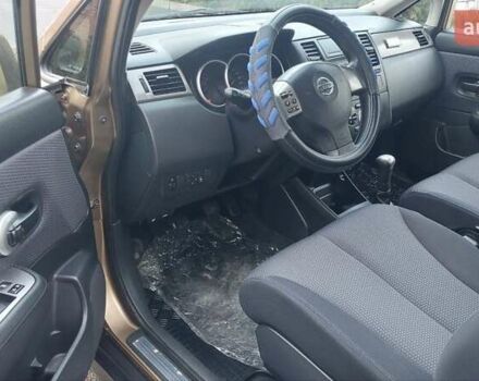 Бежевый Ниссан Тиида, объемом двигателя 1.6 л и пробегом 100 тыс. км за 6100 $, фото 18 на Automoto.ua