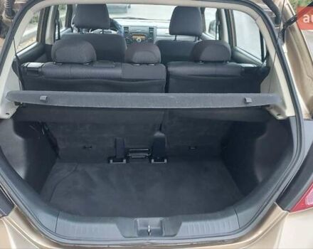 Бежевый Ниссан Тиида, объемом двигателя 1.6 л и пробегом 100 тыс. км за 6100 $, фото 11 на Automoto.ua