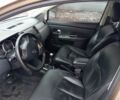 Бежевый Ниссан Тиида, объемом двигателя 1.8 л и пробегом 252 тыс. км за 6900 $, фото 2 на Automoto.ua
