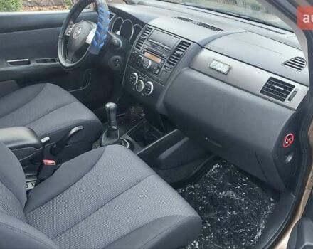 Бежевый Ниссан Тиида, объемом двигателя 1.6 л и пробегом 100 тыс. км за 6100 $, фото 17 на Automoto.ua