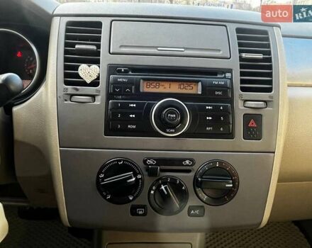 Бежевый Ниссан Тиида, объемом двигателя 1.6 л и пробегом 150 тыс. км за 6500 $, фото 17 на Automoto.ua