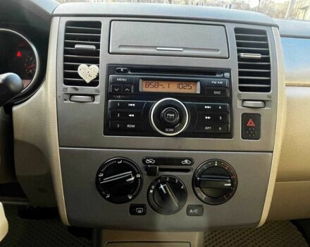 Бежевый Ниссан Тиида, объемом двигателя 1.6 л и пробегом 150 тыс. км за 6500 $, фото 17 на Automoto.ua