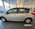 Бежевый Ниссан Тиида, объемом двигателя 1.6 л и пробегом 150 тыс. км за 7300 $, фото 3 на Automoto.ua