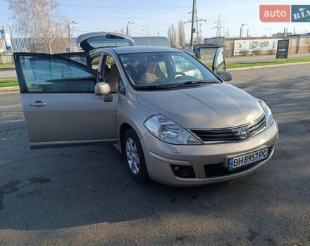 Бежевый Ниссан Тиида, объемом двигателя 1.6 л и пробегом 120 тыс. км за 6900 $, фото 9 на Automoto.ua