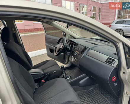 Бежевый Ниссан Тиида, объемом двигателя 1.6 л и пробегом 152 тыс. км за 6999 $, фото 24 на Automoto.ua