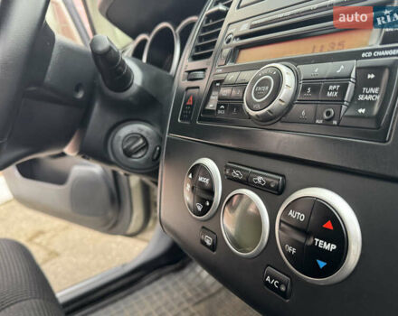 Бежевый Ниссан Тиида, объемом двигателя 1.6 л и пробегом 152 тыс. км за 6999 $, фото 22 на Automoto.ua