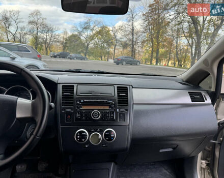 Бежевый Ниссан Тиида, объемом двигателя 1.6 л и пробегом 152 тыс. км за 6999 $, фото 21 на Automoto.ua