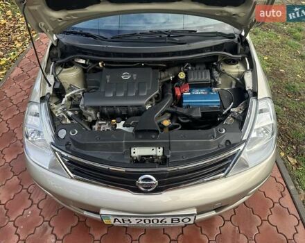 Бежевый Ниссан Тиида, объемом двигателя 1.6 л и пробегом 77 тыс. км за 7650 $, фото 43 на Automoto.ua