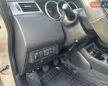 Бежевый Ниссан Тиида, объемом двигателя 1.6 л и пробегом 77 тыс. км за 7650 $, фото 16 на Automoto.ua