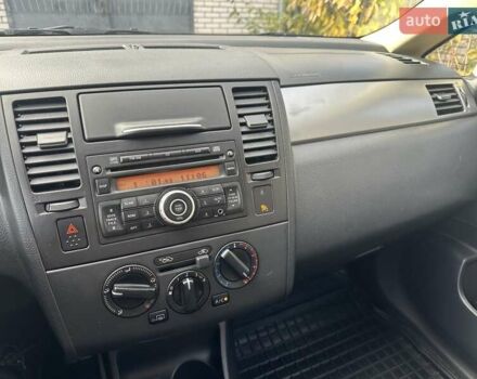 Бежевый Ниссан Тиида, объемом двигателя 1.6 л и пробегом 77 тыс. км за 7650 $, фото 40 на Automoto.ua