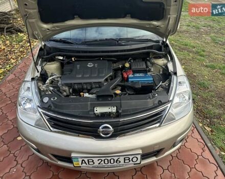 Бежевый Ниссан Тиида, объемом двигателя 1.6 л и пробегом 77 тыс. км за 7650 $, фото 47 на Automoto.ua