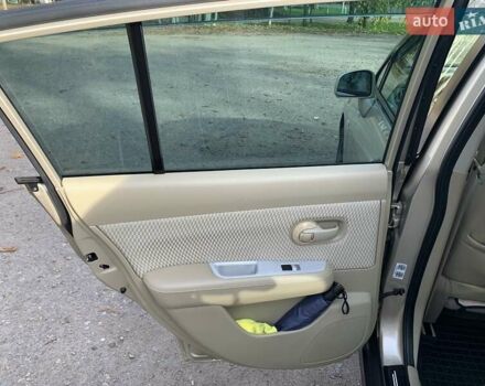 Бежевый Ниссан Тиида, объемом двигателя 1.5 л и пробегом 113 тыс. км за 7500 $, фото 55 на Automoto.ua