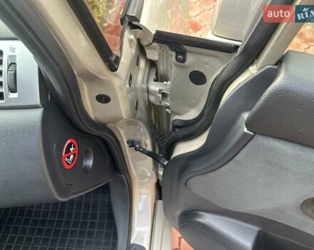 Бежевый Ниссан Тиида, объемом двигателя 1.6 л и пробегом 77 тыс. км за 7650 $, фото 22 на Automoto.ua