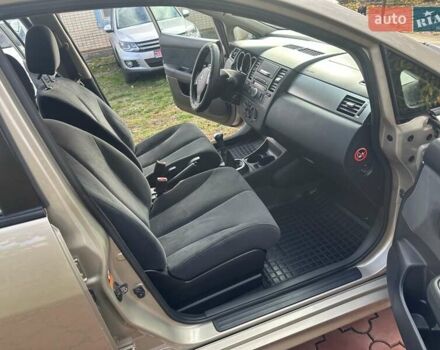 Бежевый Ниссан Тиида, объемом двигателя 1.6 л и пробегом 77 тыс. км за 7650 $, фото 24 на Automoto.ua