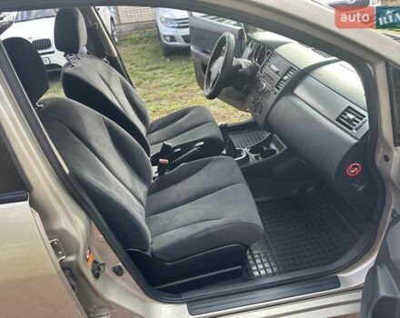 Бежевый Ниссан Тиида, объемом двигателя 1.6 л и пробегом 77 тыс. км за 7650 $, фото 25 на Automoto.ua