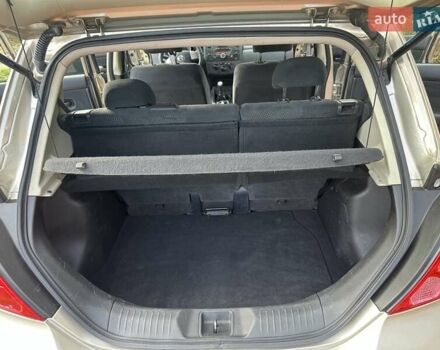 Бежевый Ниссан Тиида, объемом двигателя 1.6 л и пробегом 77 тыс. км за 7650 $, фото 33 на Automoto.ua