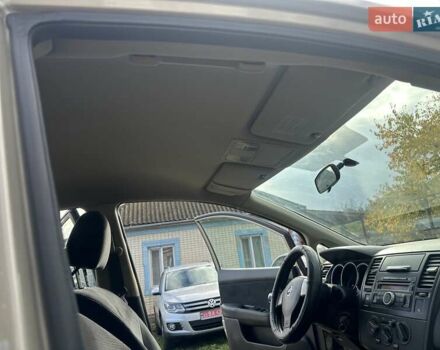 Бежевый Ниссан Тиида, объемом двигателя 1.6 л и пробегом 77 тыс. км за 7650 $, фото 26 на Automoto.ua