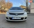 Бежевый Ниссан Тиида, объемом двигателя 1.6 л и пробегом 244 тыс. км за 4700 $, фото 1 на Automoto.ua