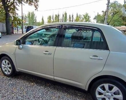 Бежевый Ниссан Тиида, объемом двигателя 1.6 л и пробегом 229 тыс. км за 6499 $, фото 2 на Automoto.ua