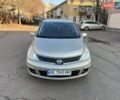 Бежевый Ниссан Тиида, объемом двигателя 1.6 л и пробегом 244 тыс. км за 4700 $, фото 2 на Automoto.ua