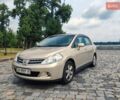 Бежевый Ниссан Тиида, объемом двигателя 1.6 л и пробегом 192 тыс. км за 5800 $, фото 1 на Automoto.ua