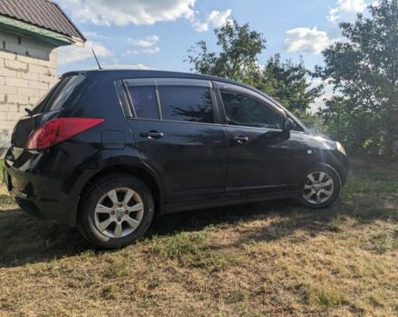 Черный Ниссан Тиида, объемом двигателя 1.6 л и пробегом 209 тыс. км за 4400 $, фото 2 на Automoto.ua