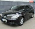 Черный Ниссан Тиида, объемом двигателя 1.6 л и пробегом 143 тыс. км за 5800 $, фото 1 на Automoto.ua