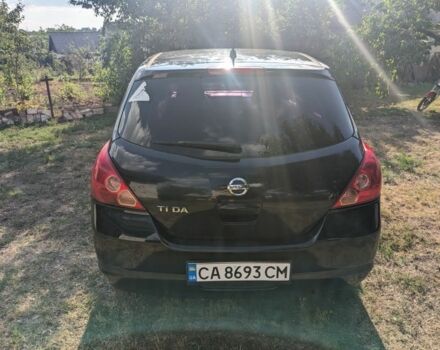 Черный Ниссан Тиида, объемом двигателя 1.6 л и пробегом 209 тыс. км за 4400 $, фото 5 на Automoto.ua