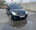 Черный Ниссан Тиида, объемом двигателя 1.8 л и пробегом 226 тыс. км за 4200 $, фото 4 на Automoto.ua