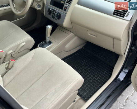 Черный Ниссан Тиида, объемом двигателя 1.6 л и пробегом 172 тыс. км за 6900 $, фото 36 на Automoto.ua