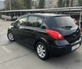 Черный Ниссан Тиида, объемом двигателя 1.8 л и пробегом 226 тыс. км за 4200 $, фото 1 на Automoto.ua