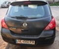 Черный Ниссан Тиида, объемом двигателя 1.6 л и пробегом 313 тыс. км за 3500 $, фото 1 на Automoto.ua