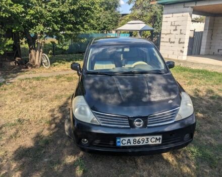 Черный Ниссан Тиида, объемом двигателя 1.6 л и пробегом 209 тыс. км за 4400 $, фото 1 на Automoto.ua