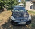 Черный Ниссан Тиида, объемом двигателя 1.6 л и пробегом 209 тыс. км за 4400 $, фото 1 на Automoto.ua