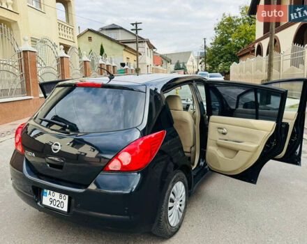 Черный Ниссан Тиида, объемом двигателя 1.6 л и пробегом 187 тыс. км за 5800 $, фото 1 на Automoto.ua